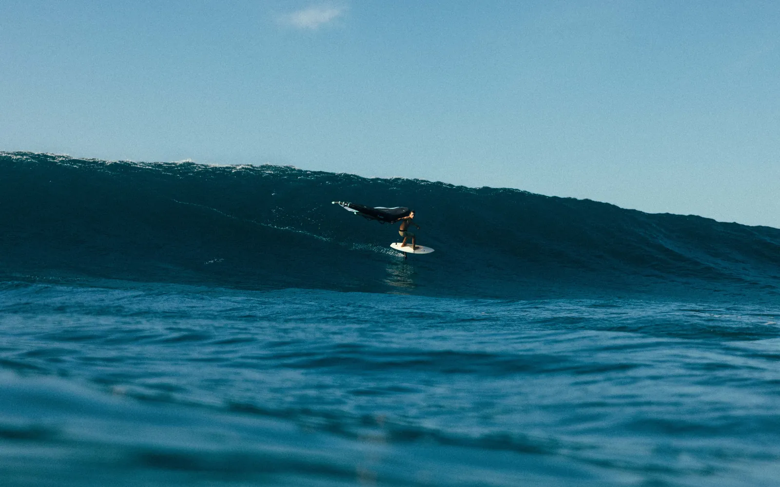 A foiler on a long wall of open-ocean swell