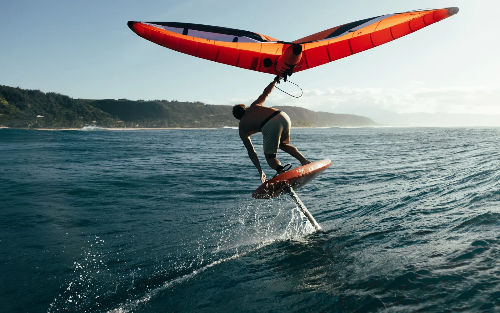 Edo Tanas wing foiling off Oahu's north shore